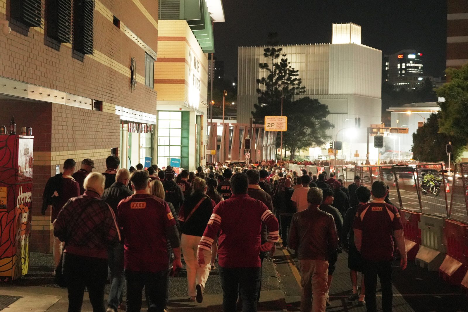 Crowds at a public city street celebration managed with crowd control barriers