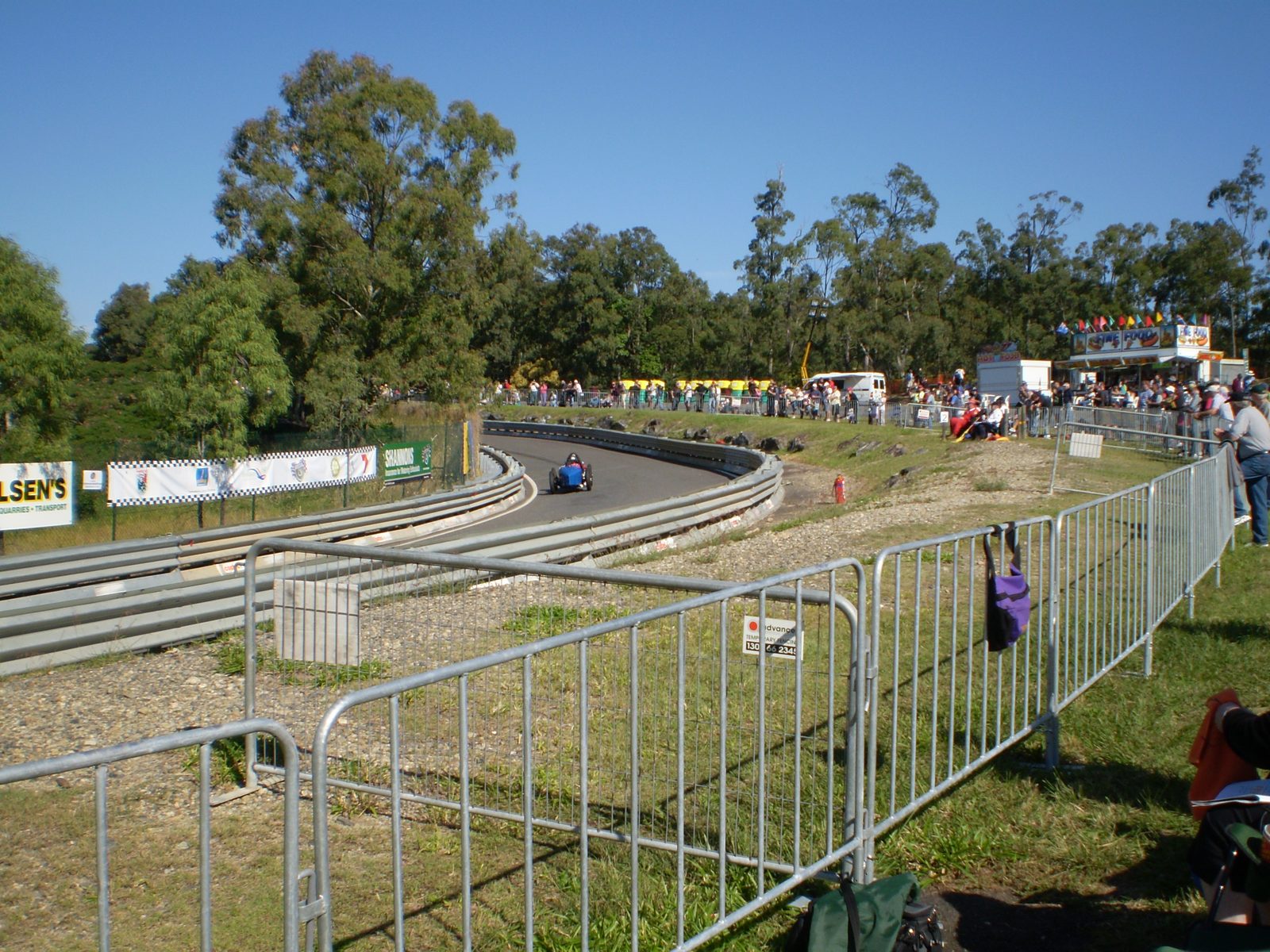 Crowd control barriers lining an event walkway - photo 3